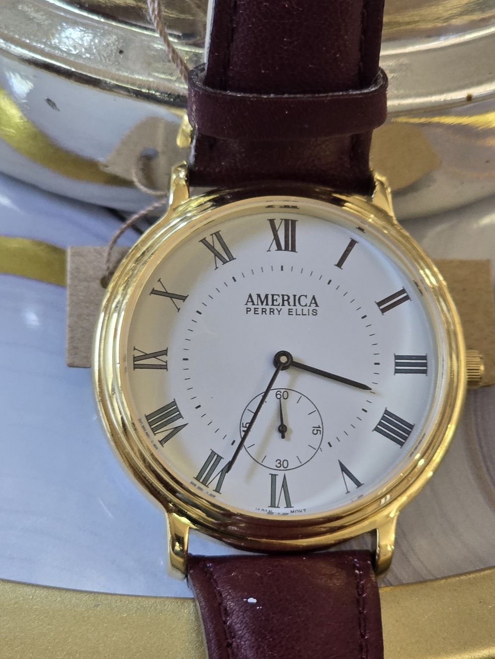 Perry Ellis Gold-Tone Case with Burgundy Leather Strap Watch